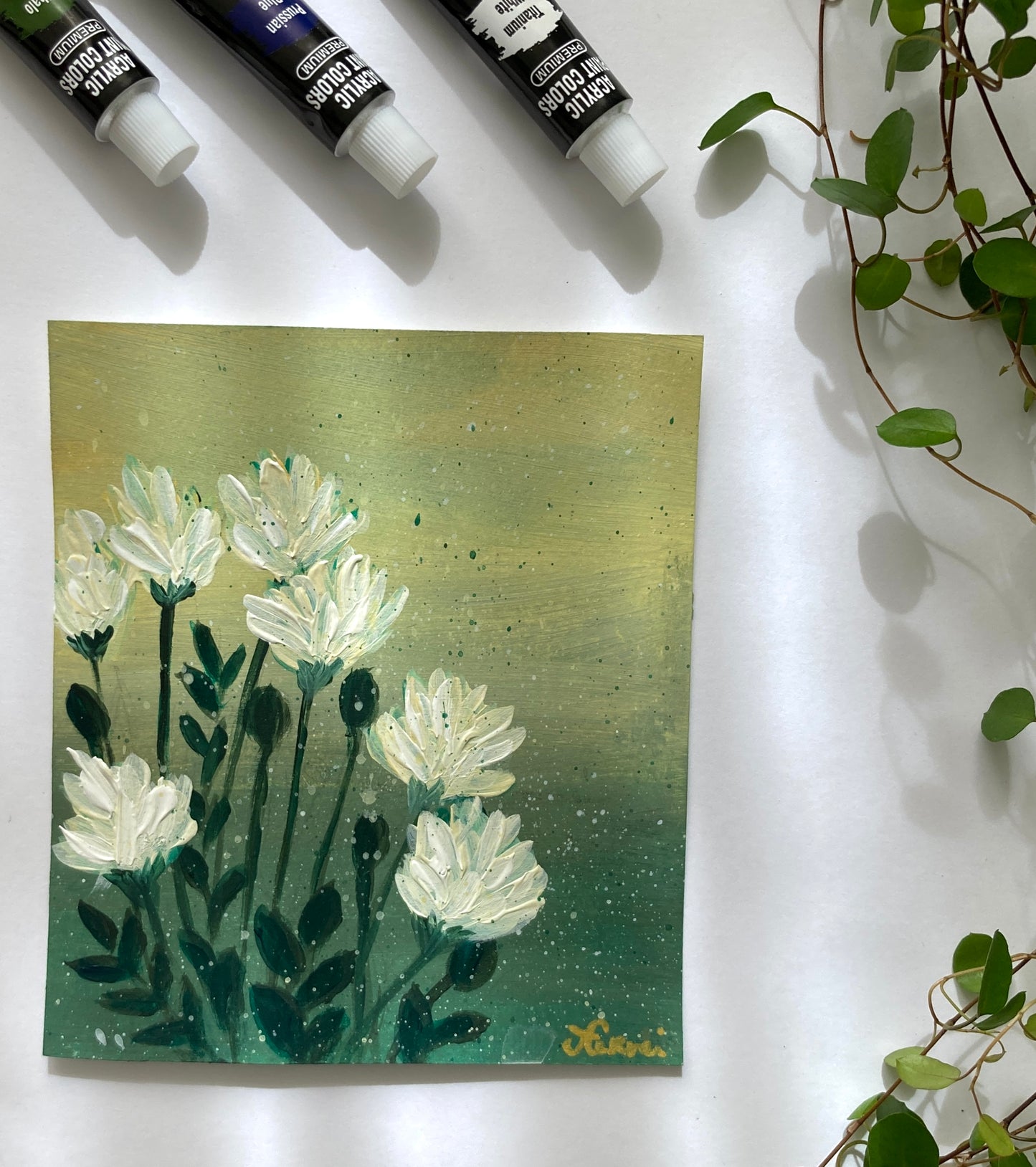 White flowers on green and yellow