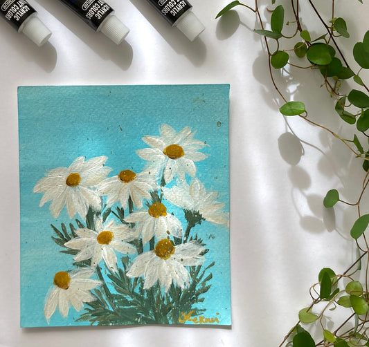 Daisies on blue